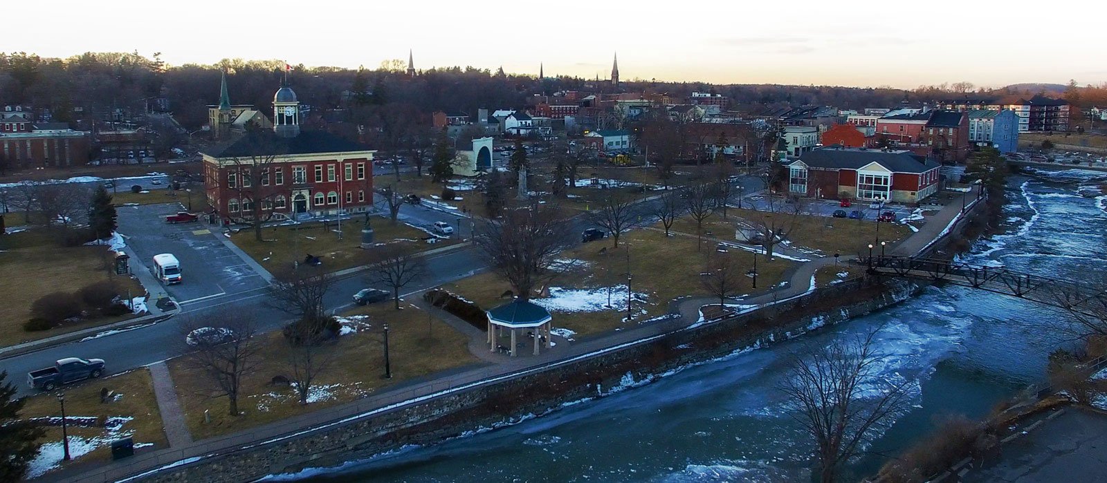 Aerial photo of downtown Port Hope in the winter overlooking Ganaraska River out to rural area